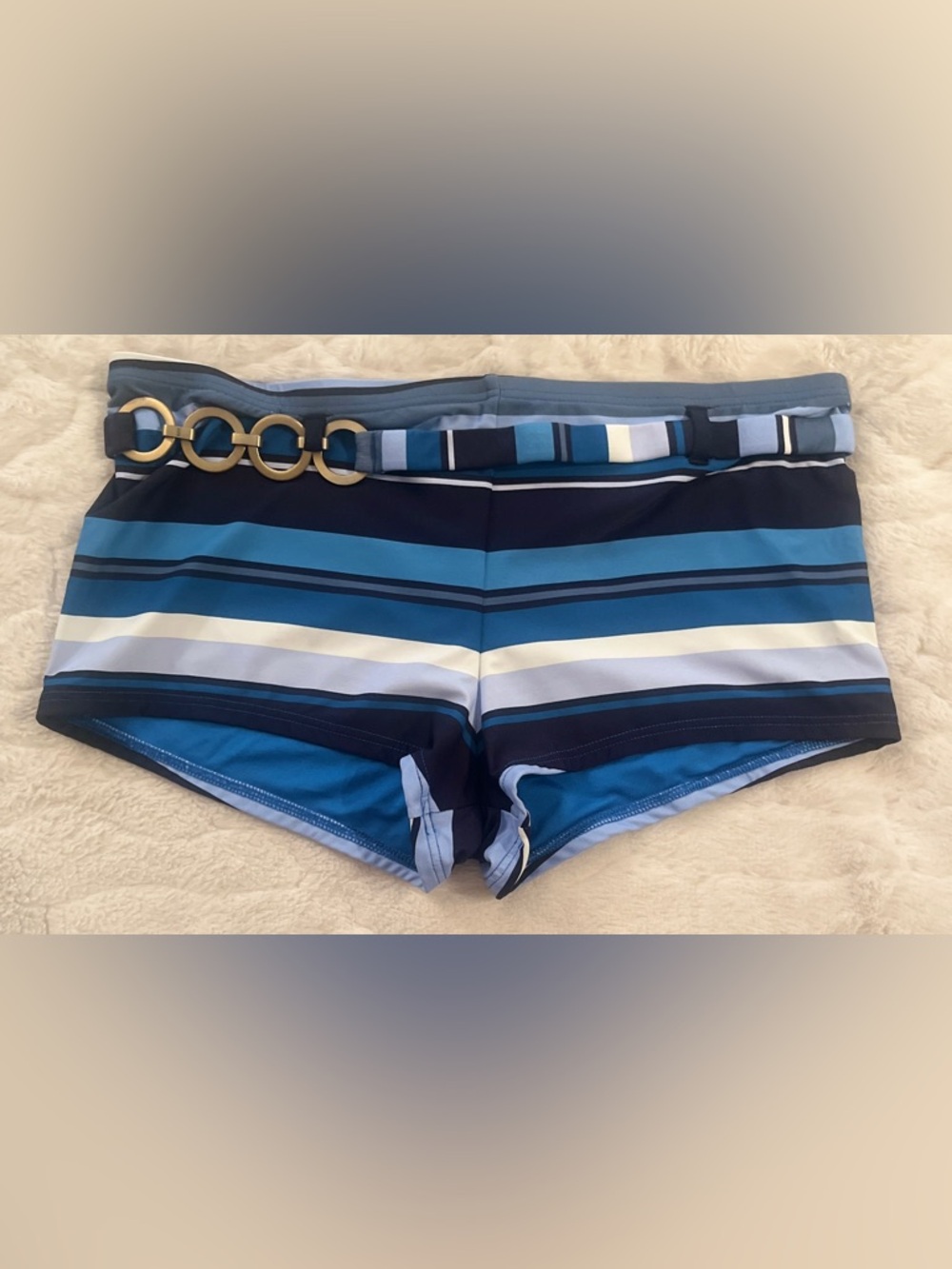 MICHAEL Michael Kors striped swim shorts with a unique gold ring belt detail.S